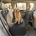 Dog car hammock installed in a bright modern SUV with a dog