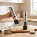 Electric Salt and Pepper Grinder Set styled on a bright modern kitchen counter